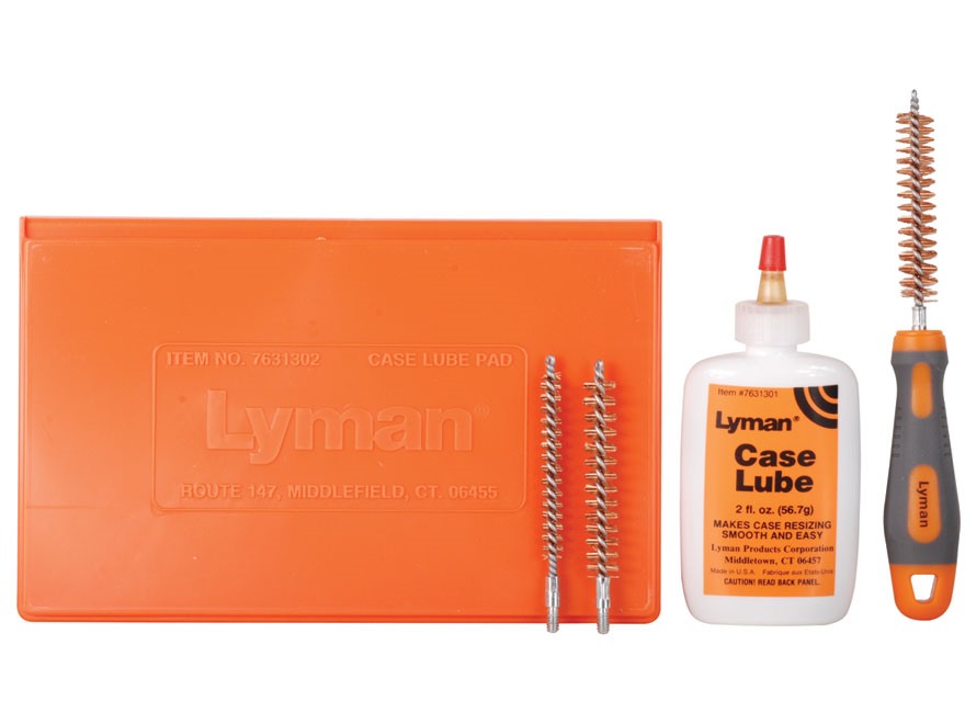 Lyman case lube kit with orange pad, case lube bottle, and cleaning brushes