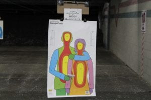 View of indoor shooting range booth with firearm at the Oklahoma City range facility
