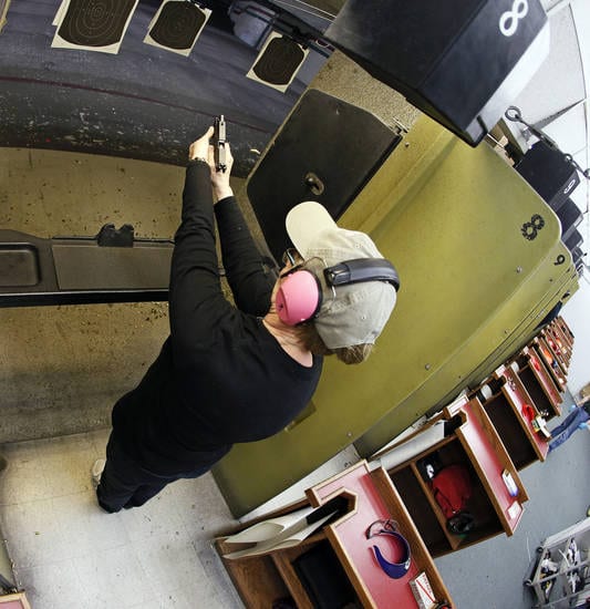Donna Creed fires her handgun on a gun range during a concealed-carry class at H&H Gun Range and Shooting Sports Complex in Oklahoma City, Wednesday, Jan. 23, 2013. Photo by Nate Billings, The Oklahoman