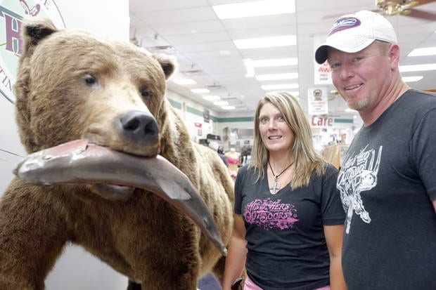 Stacey Sissney and Jon Sissney pose for a photo at H&H Shooting Sports, Friday July 19, 2013, in Oklahoma City. Photo by Sarah Phipps, The Oklahoman photo - Stacey Sissney and Jon Sissney pose for a photo at H&H Shooting Sports, Friday July 19, 2013, in Oklahoma City. Photo by Sarah Phipps, The Oklahoman