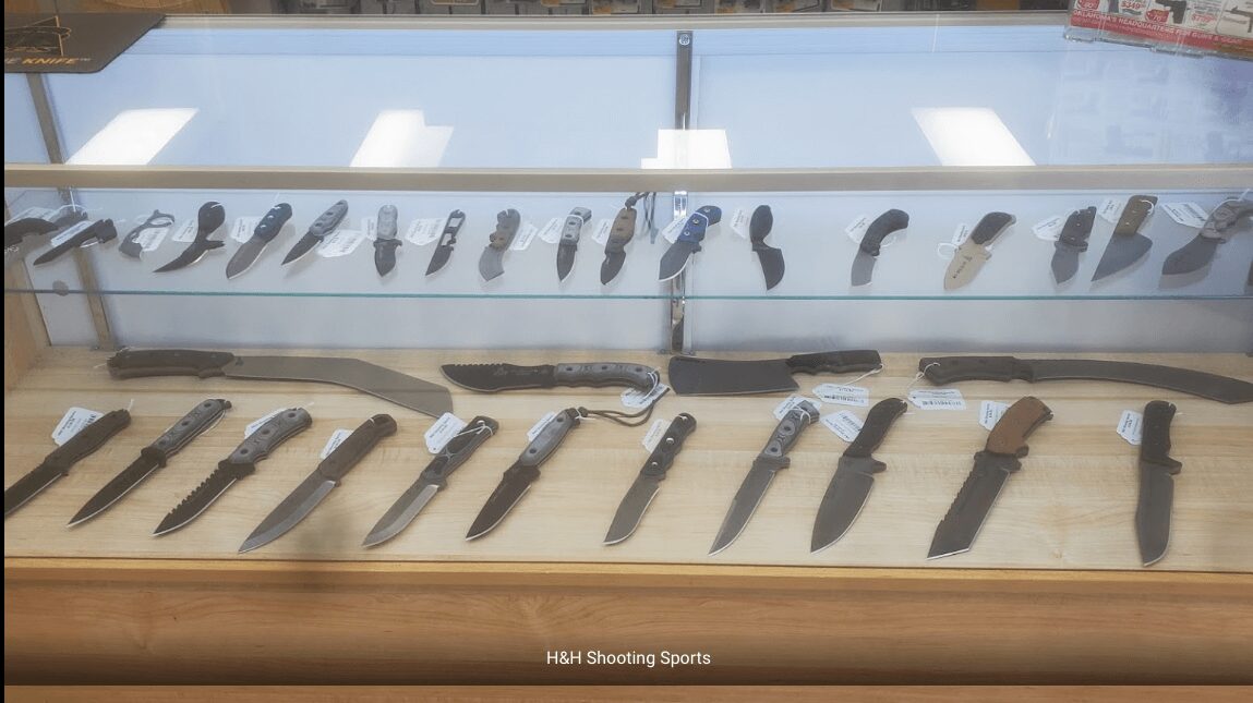 A display case of knives at H&H Shooting Sports in Oklahoma City