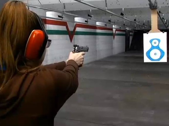 Handgun recoil control technique during shooting with tactical light